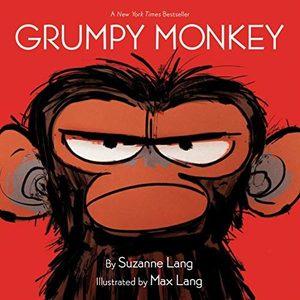 Cover of “Grumpy Monkey” by Suzanne Lang — a scowling monkey glaring on a bright red background.