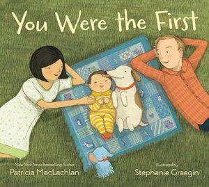 Cover of “You Were the First” by Patricia MacLachlan — a family and their dog resting together on a patchwork quilt.